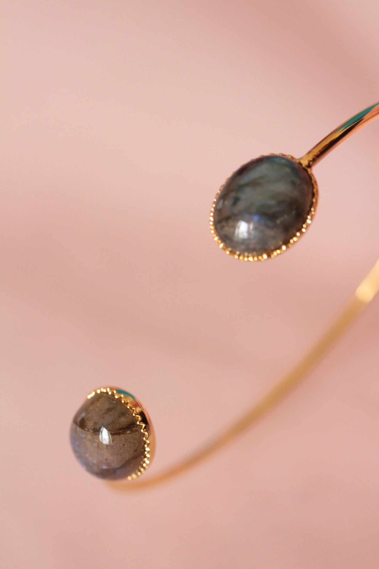 Bangle bracelet with two natural mother-of-pearl stones gilded with fine gold