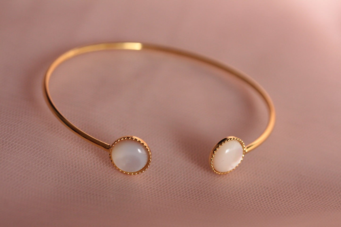 Bangle bracelet with two adjustable natural mother-of-pearl stones gilded with fine gold Emmanuelle