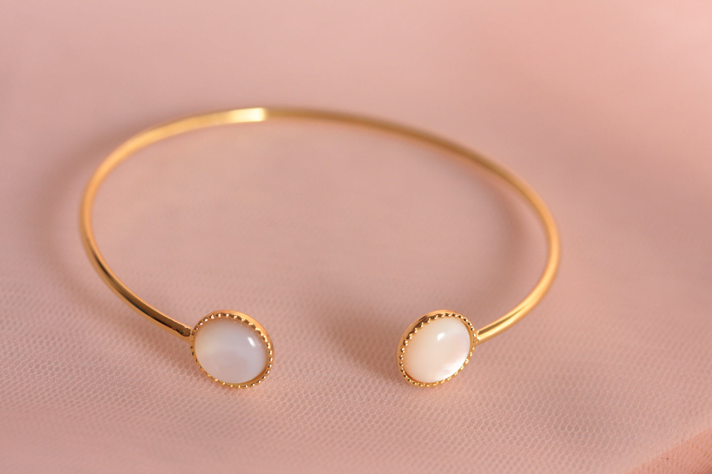 Bangle bracelet with two adjustable natural mother-of-pearl stones gilded with fine gold Emmanuelle