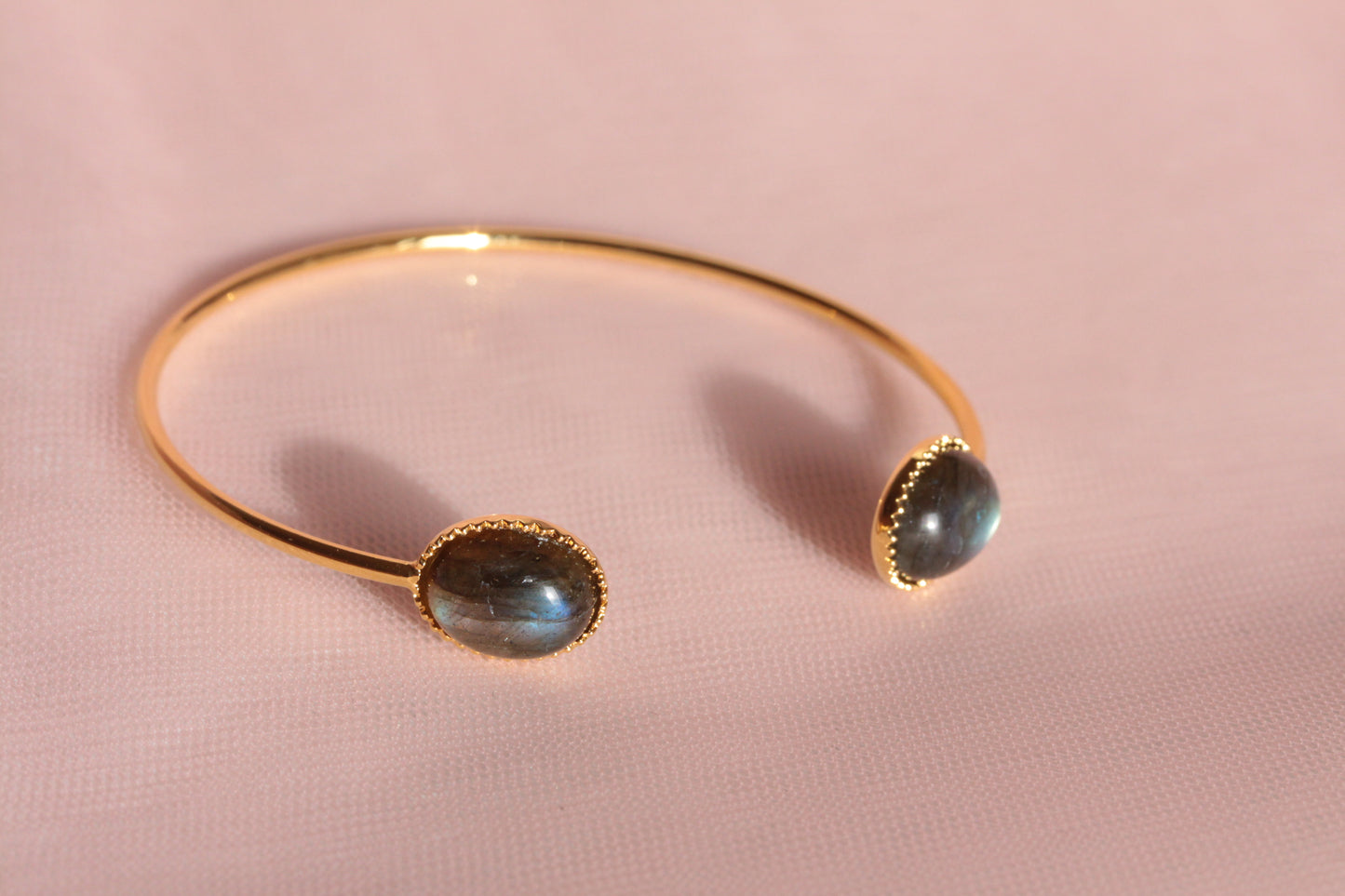 Bangle bracelet with two natural mother-of-pearl stones gilded with fine gold