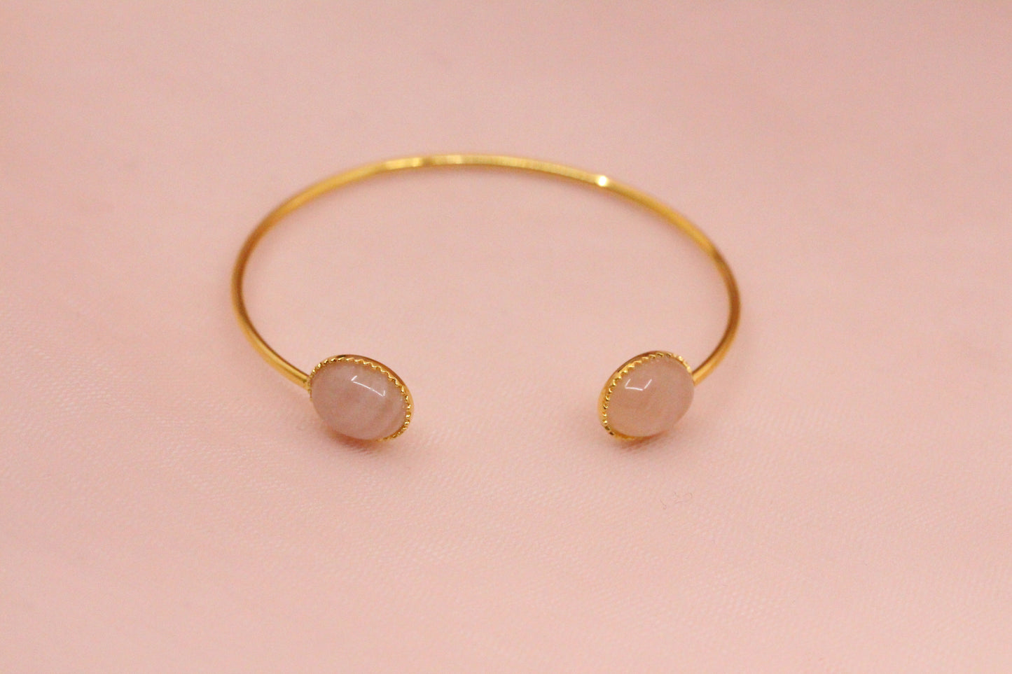 Bangle bracelet with two natural mother-of-pearl stones gilded with fine gold